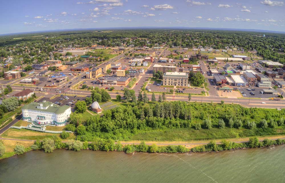 Aerial image of a city on the water.